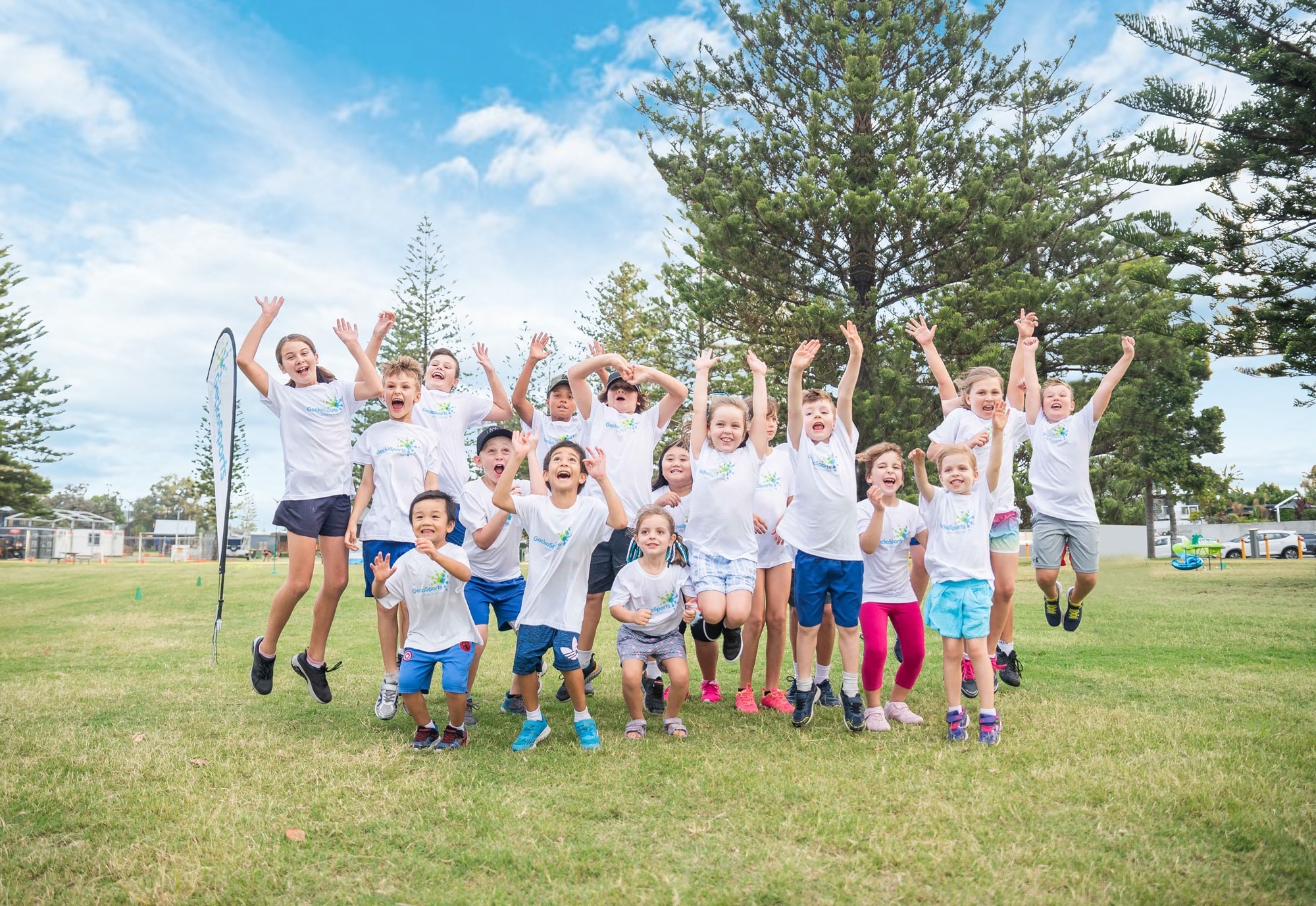 Group of Kids Jumping Hero Website Banner Image_BLU3755